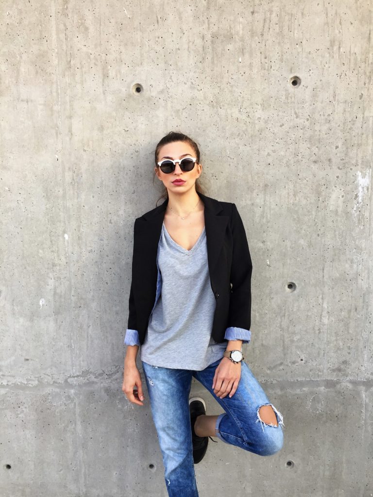 woman in a blazer and denim