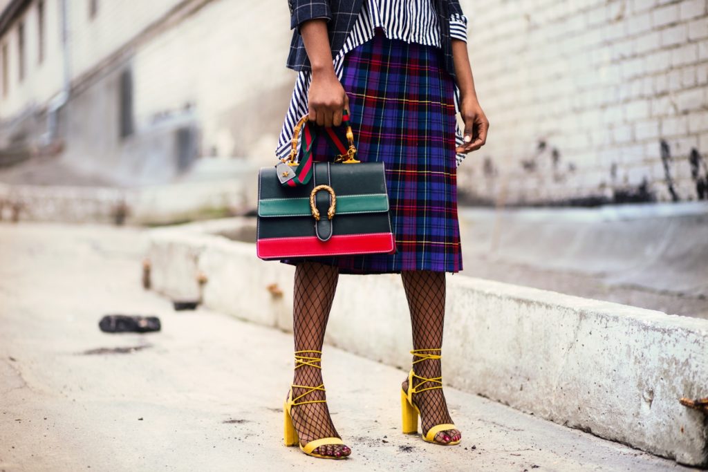 woman in a plaid skirt